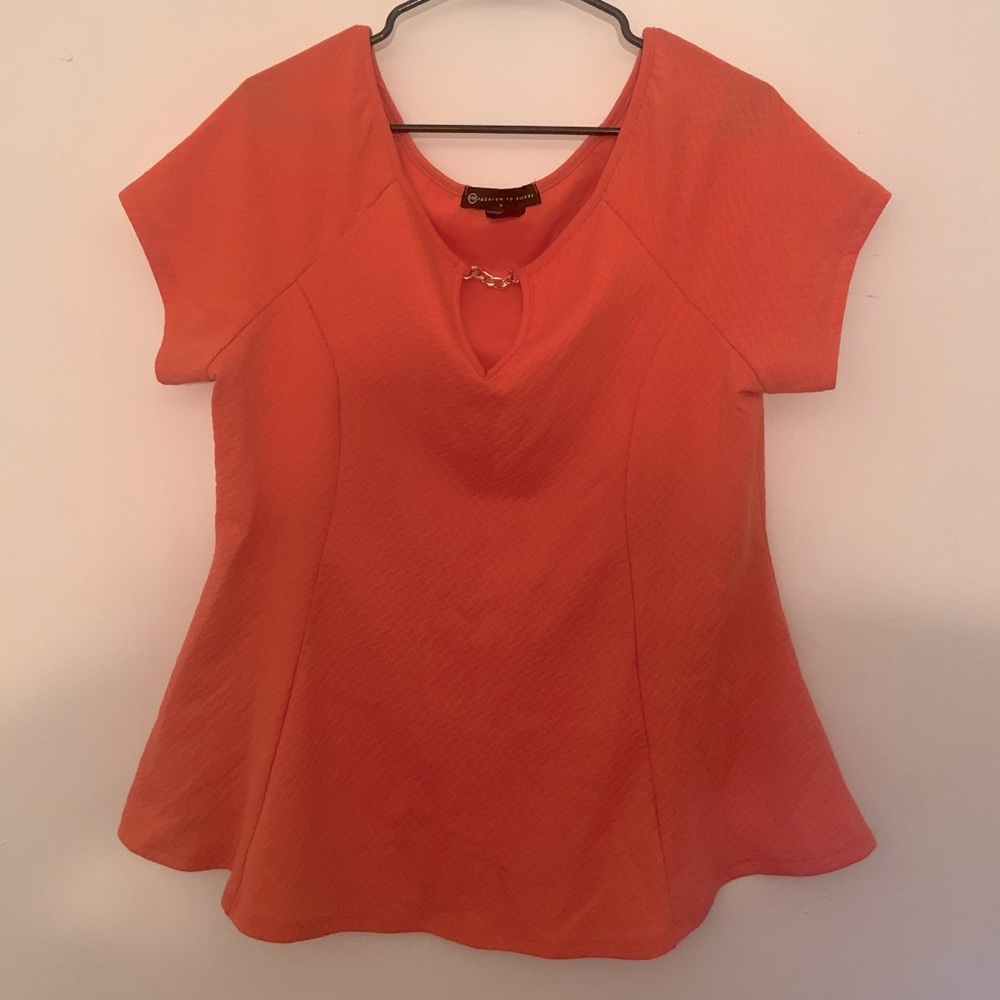 Peach/orange peplum blouse with gold chain keyhole